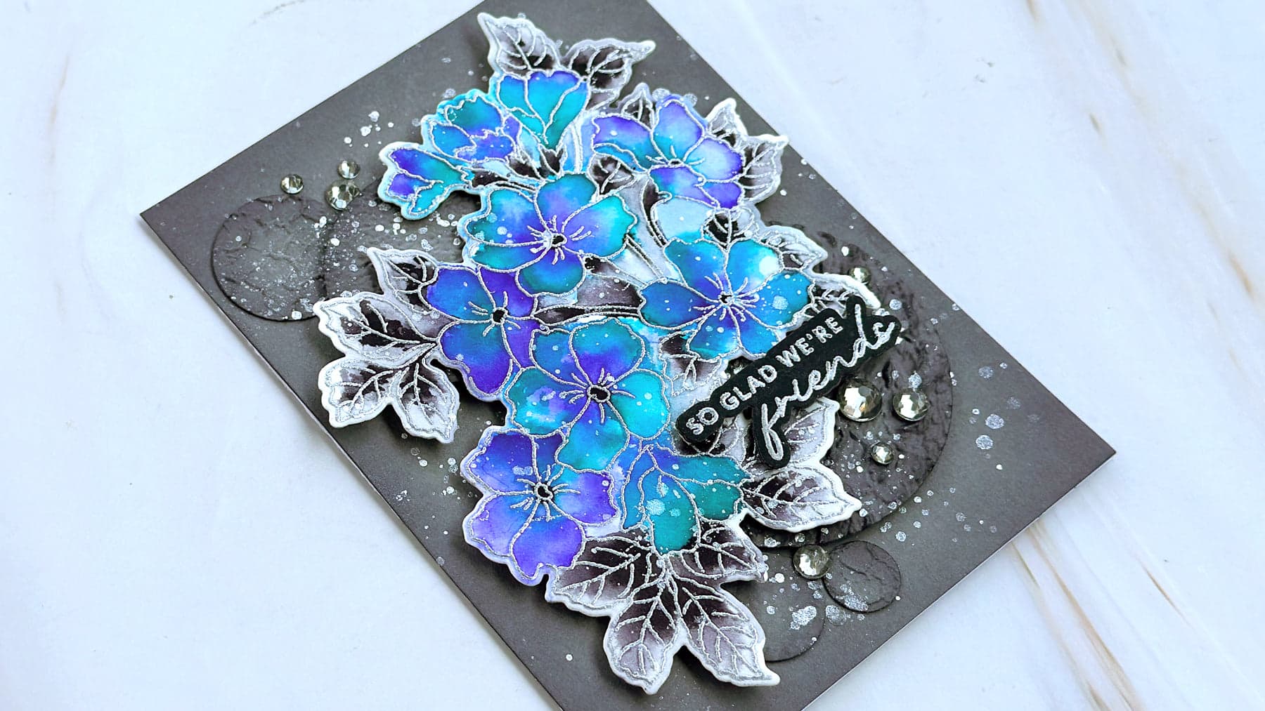 Jewel toned floral watercolor card with silver embossing