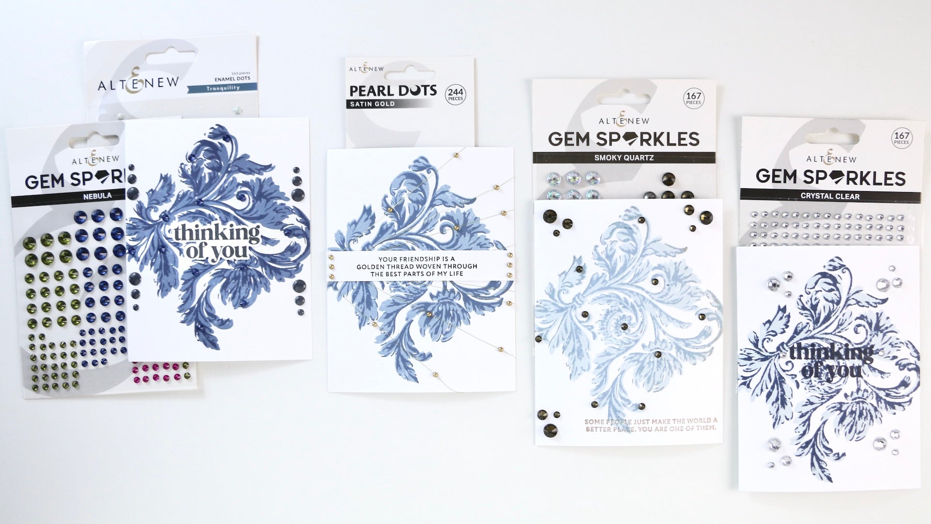 The photo shows all four cards finished, side by side