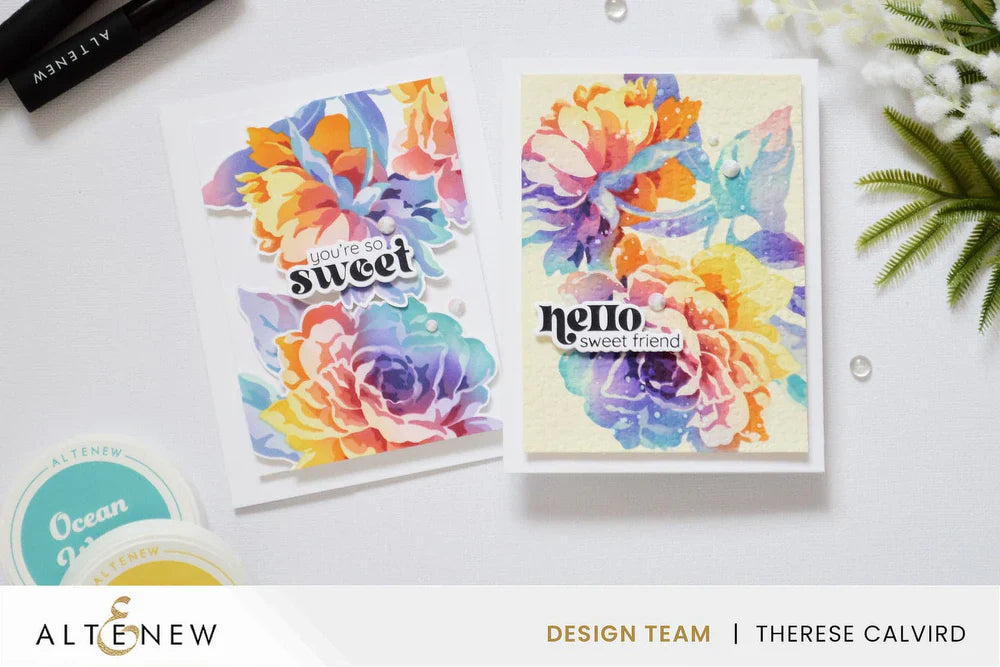 Two floral cards in rainbow colors.