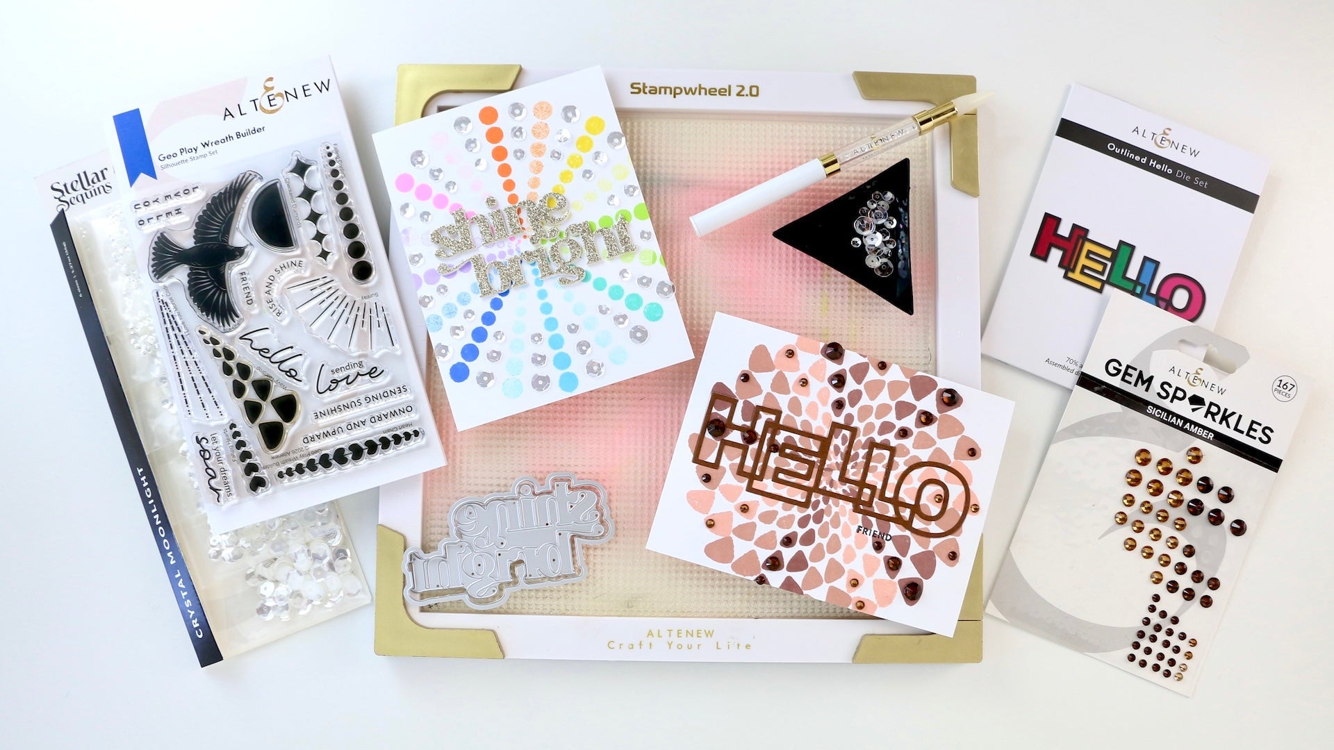 The photo shows the two cards made with the Geo Play Wreath Builder 