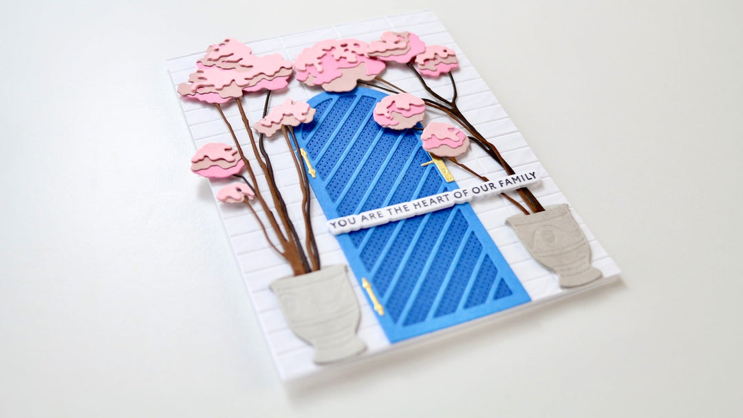 The featured photo shows the finished card made with the Arched Doors Layering die set. 