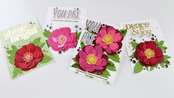The photo shows the four cards featuring the Coral Charm Peony Craft-A-Flower set. 