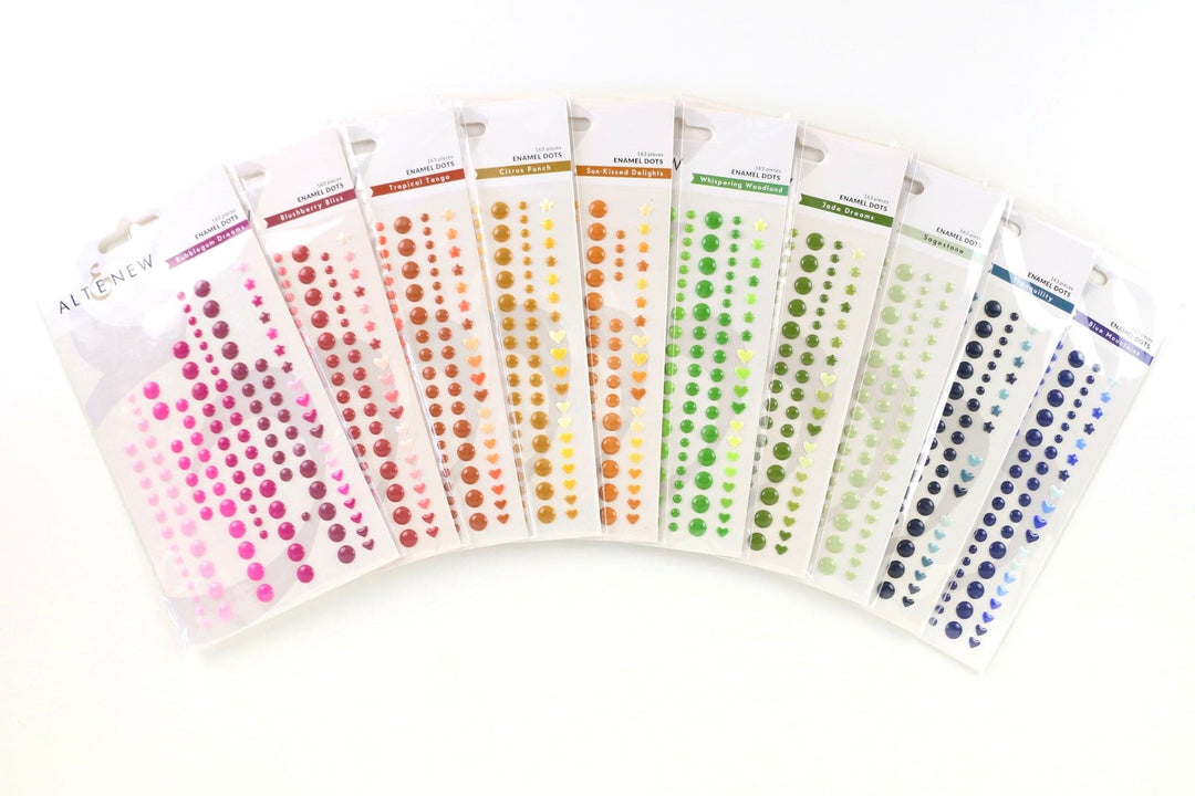 The photo shows a selection of enamel dots. 