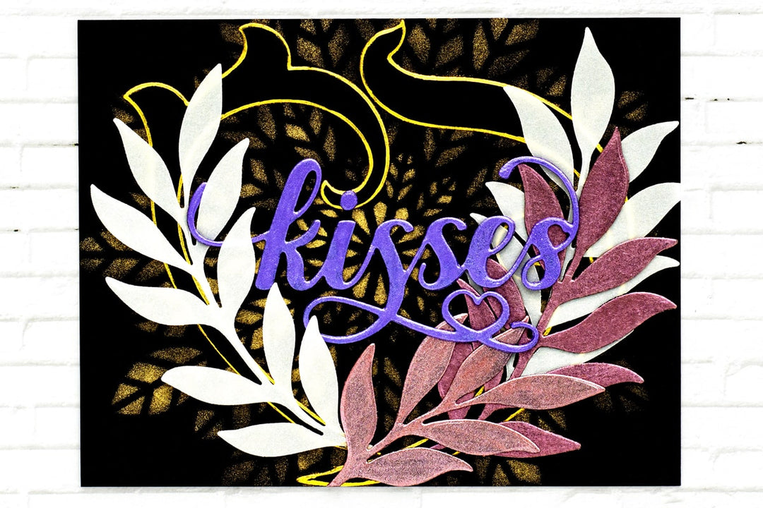 Metallic elements on black cardstock