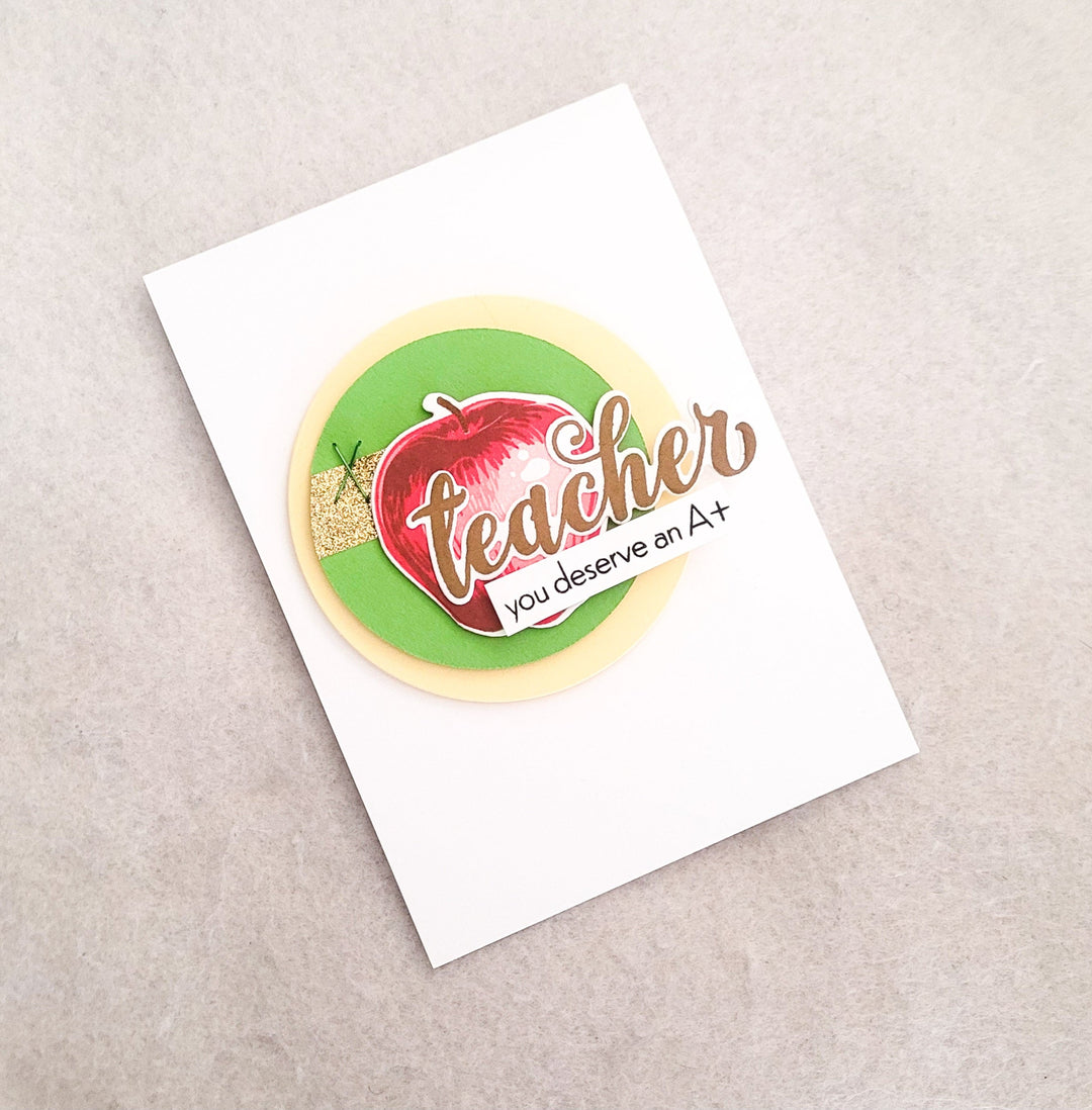 Clean and Simple DIY teacher appreciation card featuring a stamped apple and gold glitter tape.