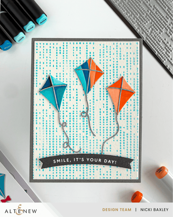 Press plates for cardmaking on a colorful Breezy Day kite card with alcohol marker coloring