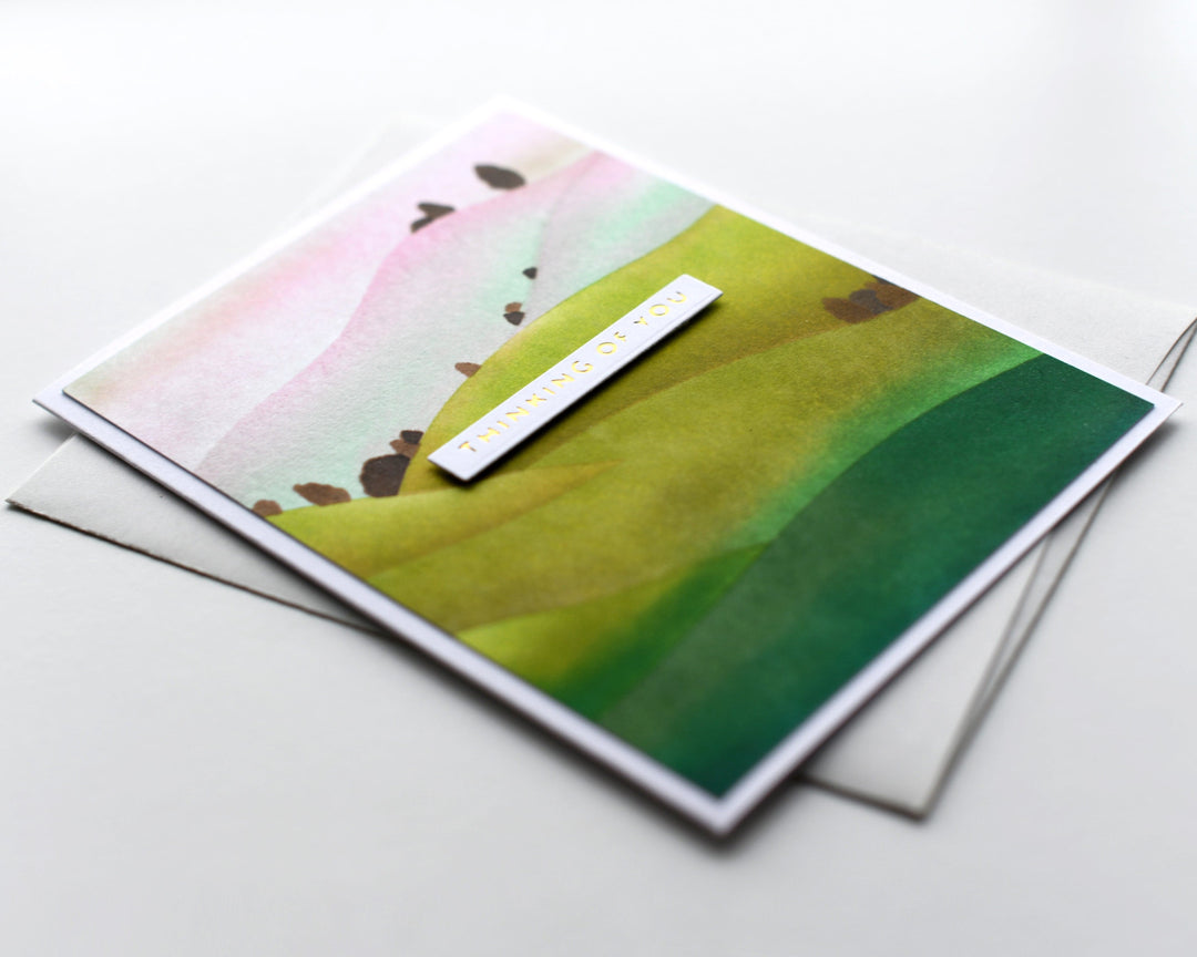 A stenciled handmade card.