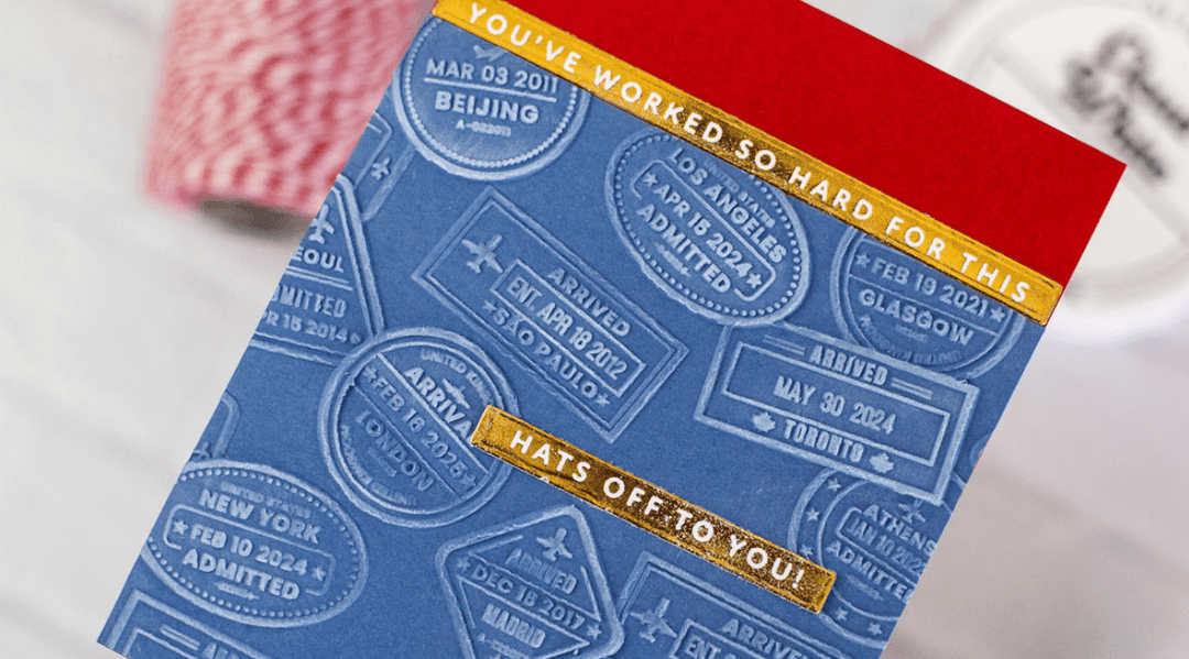 DIY masculine card idea with 3D embossed travel stamps on a blue cardstock, giving it a faded jeans look