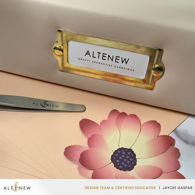 Ivory 9x12 three-ring card album by Altenew with a smooth cover, designed for storing and organizing cards or scrapbooking supplies.