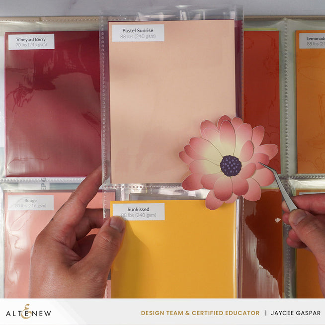 Ivory 9x12 three-ring card album by Altenew, featuring a sturdy cover and metal rings for easy page turning.