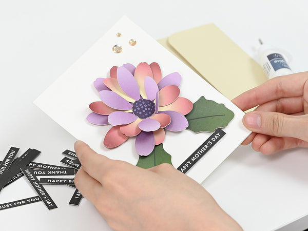 Follow the instructions to layer, press, finish your handmade card, and arrange it in your own unique way!