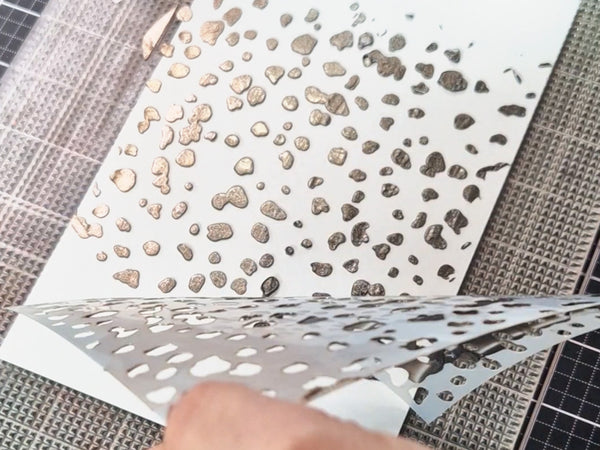 Peel the stencil away and allow the project to air dry.