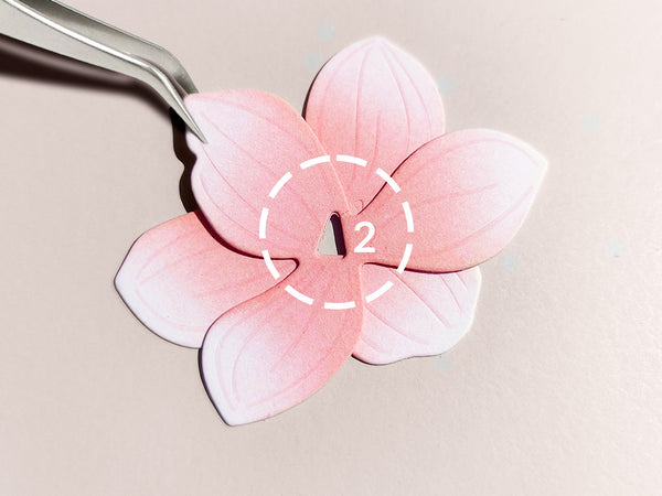 Stack the pieces by matching up the keyhole cutout.