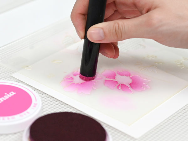 Apply ink or paste using a blending brush or palette knife.