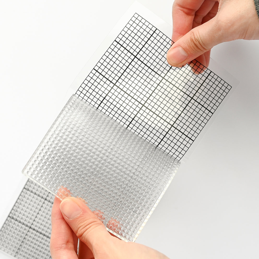 Altenew The Original Mini Sticky Mat 9x3.5 inches with classic grid pattern, used for crafting and tool organization.
