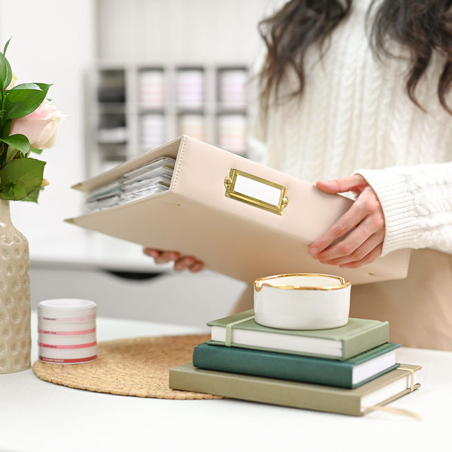 Altenew ivory 9x12 three-ring album with pocket pages, ideal for scrapbooking and storage of craft projects.