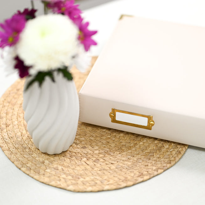 Altenew 9x12 Ivory three-ring card album with a smooth cover and metal rings, ideal for organizing and storing cards.