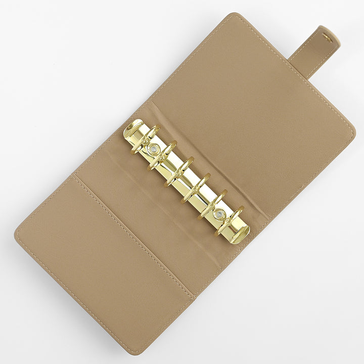 Beige Altenew Swatch Book Album A7 with tabbed pages, compact tools for organizing and storing color swatches.
