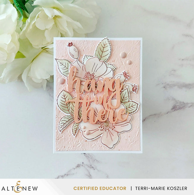 Altenew One-Go Briar Blossoms stamp, die, stencil, and embossing folder with floral design, set on a white background.