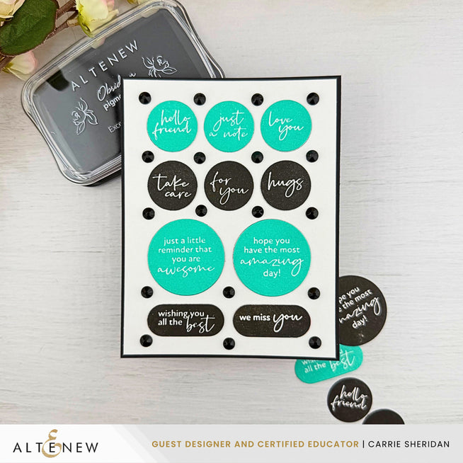 Altenew One-Go Solid Circular Sentiments dies and betterpress plate bundle with ink pads, sparkles, and crafting tools for card making.