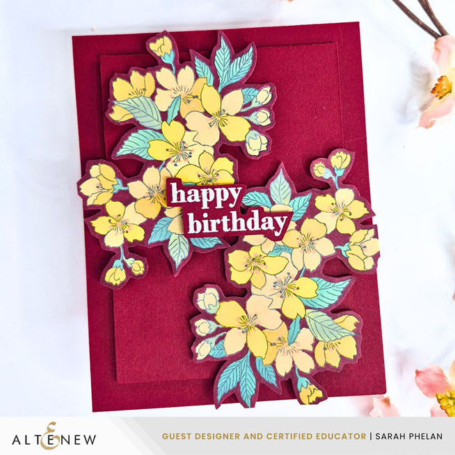 Altenew Sakura Blossoms stamp, stencil, and embossing folder bundle featuring cherry blossom designs on white paper.
