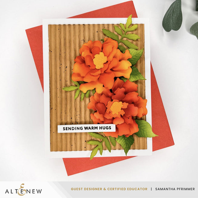 Altenew Craft-A-Flower Marigold layering die set with intricate floral dies for detailed paper crafting and card making projects.
