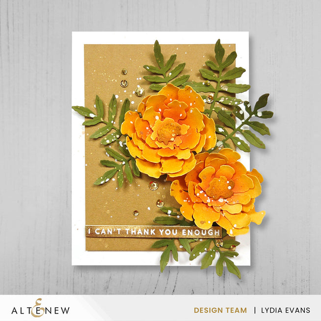 Altenew Craft-A-Flower Marigold Layering Die Set with detailed dies for creating layered marigold flower designs.