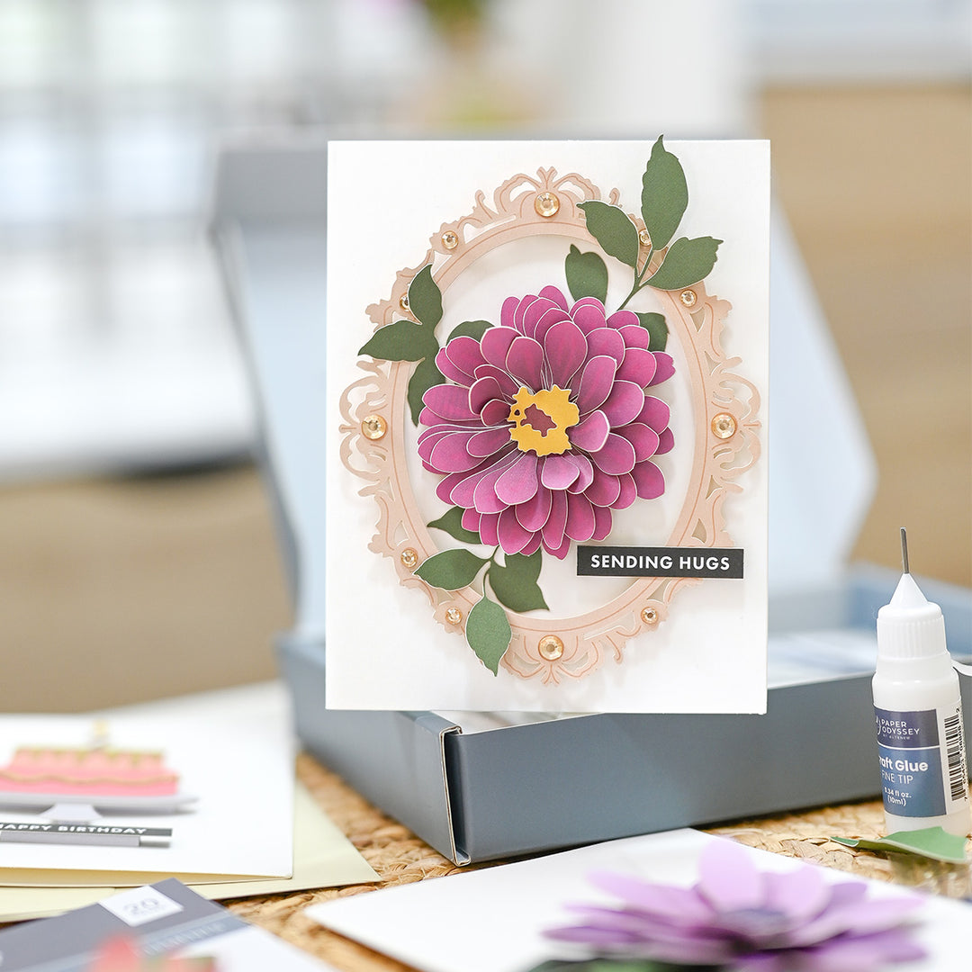 Close-up of the Altenew Floral Elegance greeting card kit featuring floral designs and crafting supplies.