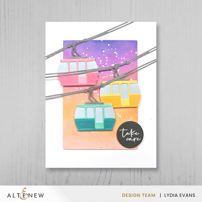 Altenew One-Go Solid Circular Sentiments dies and betterpress plate bundle with layered cable car design for card making.