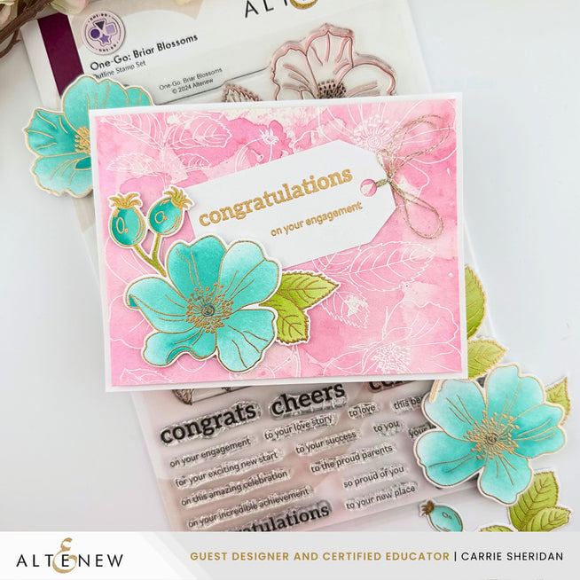 Altenew One-Go Briar Blossoms stamp, die, stencil, embossing folder with rose gold embossing powder and watercolor pan set.