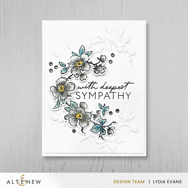 Altenew Craft Your Life Project Kit with wildflower tuft supplies and tools, featuring colorful wildflower embellishments on a craft workspace.