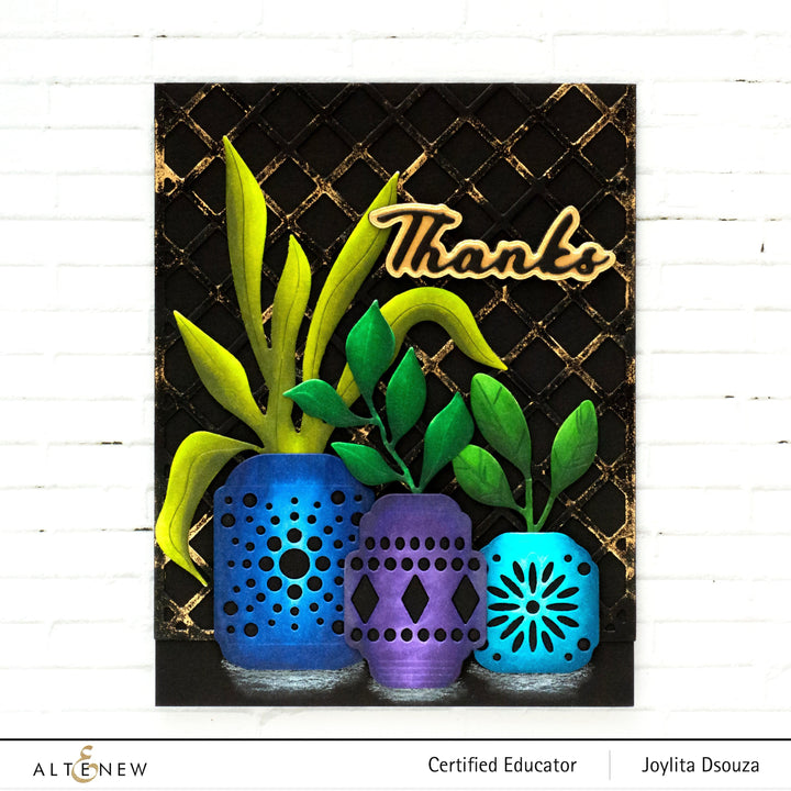Altenew Water Garden Bundle with 12 artist alcohol markers and ink in vibrant shades, displayed in a colorful set.
