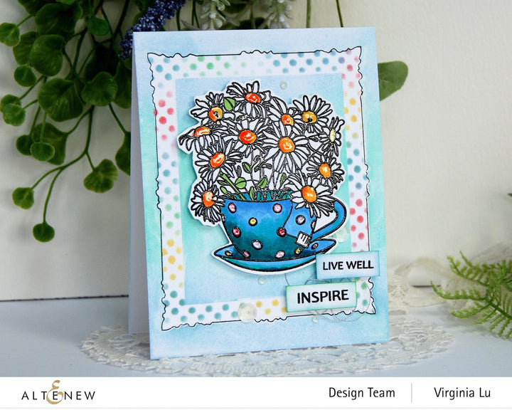 Altenew Water Garden Bundle with 12 artist alcohol markers and ink pens, featuring vibrant water-themed colors for crafting and illustration.