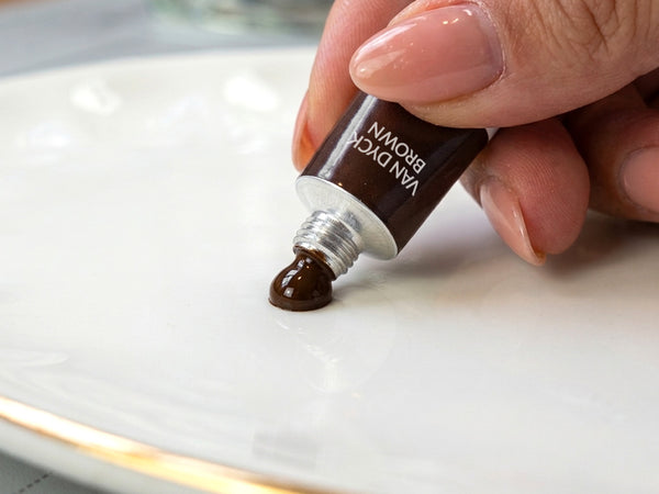 Squeeze a tiny amount of paint onto a palette.
