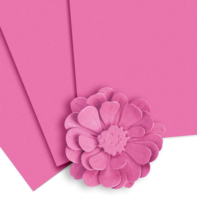 Altenew Crafty Necessities Cardstock Bundle with colorful paper sheets for crafting and scrapbooking projects.