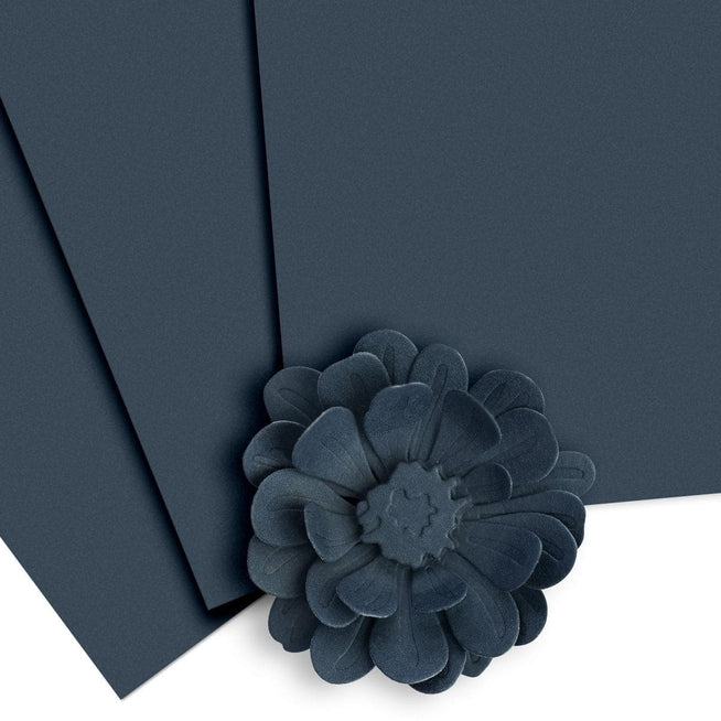 Altenew Crafty Necessities cardstock bundle featuring colorful sheets of textured paper for crafts and creative projects.