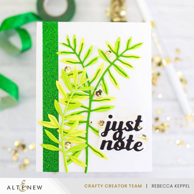 Altenew Crafty Necessities cardstock bundle showing colorful sheets of thick paper for crafting and card making.