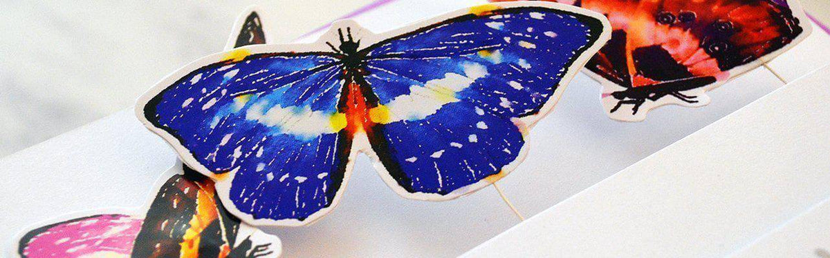 Altenew Runway Inspired Card Making On Demand Class showing colorful paper crafts and card designs on a workspace.