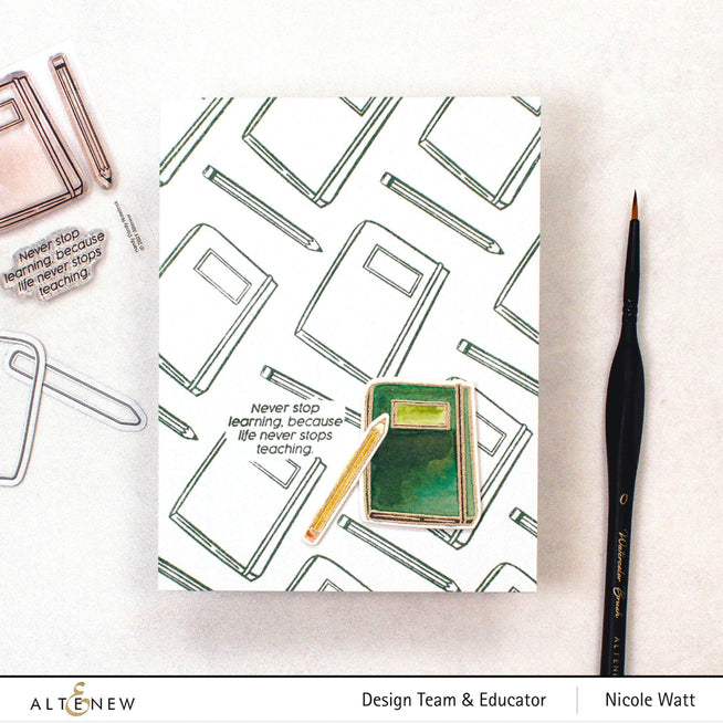 Altenew Handy Dandy Notebook Stamp Set with clear rubber stamps featuring notebook and writing-themed designs.