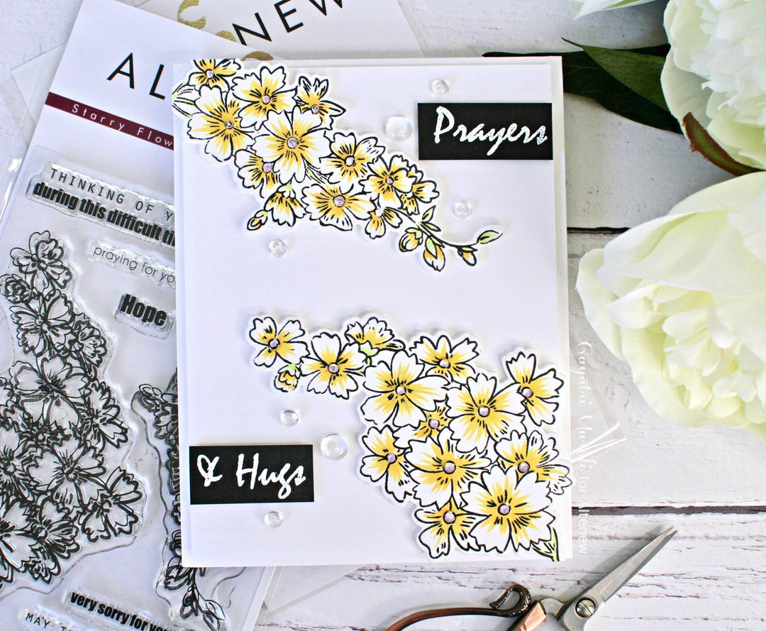 Altenew Starry Flowers Clear Stamp Set with floral and starry designs on transparent stamps for crafting projects.
