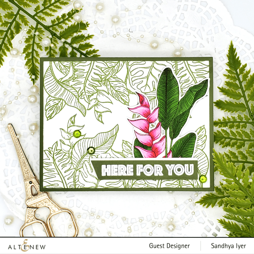 Altenew Tropical Jungle clear stamp set with tropical leaves and exotic plant images for crafting and card making.