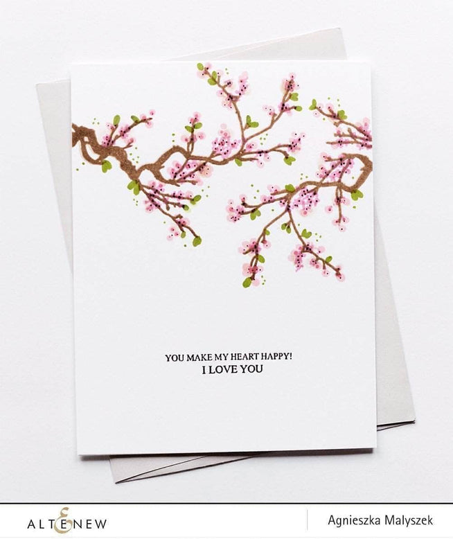 Altenew Under the Cherry Blossom Tree clear stamp set featuring cherry blossom images and floral designs for crafting projects.