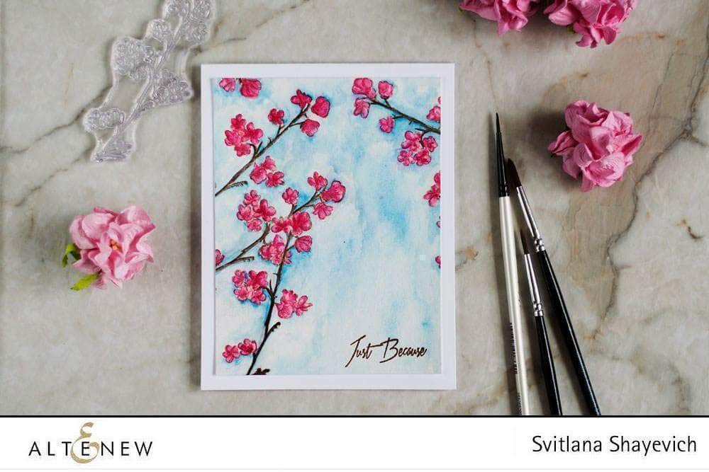 Altenew Under the Cherry Blossom Tree clear stamp set with floral designs on transparent sheets for crafting projects.
