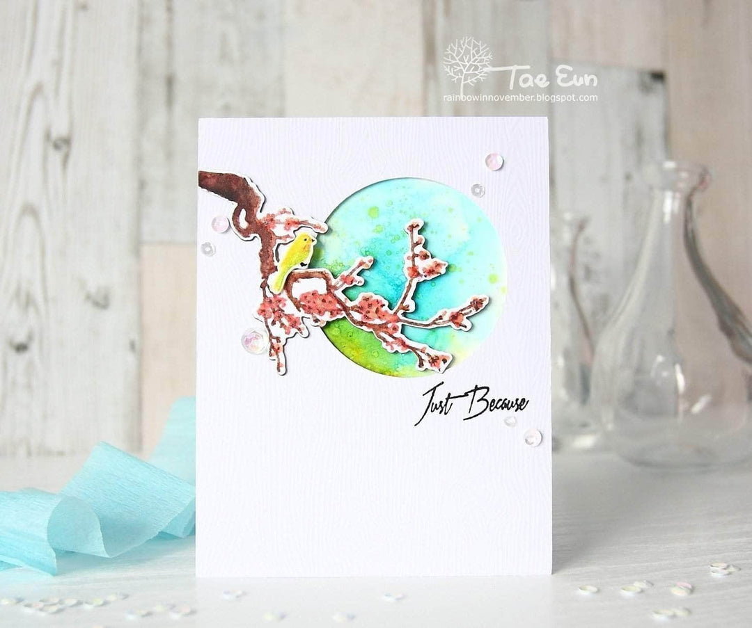 Altenew Under the Cherry Blossom Tree clear stamp set with floral and branch images for crafting and card making.