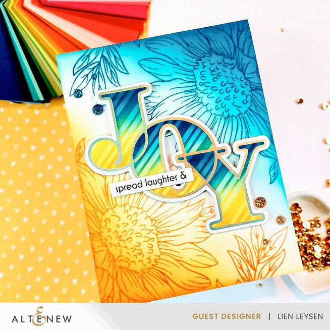 Altenew Joy die, stencil, and hot foil plate bundle featuring festive holiday designs for card making and craft projects.