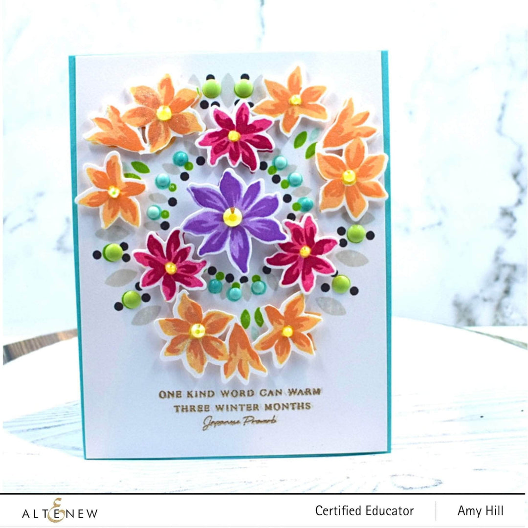 Altenew Blissful Blossoms die set featuring intricate floral die cuts for card-making and paper crafts.