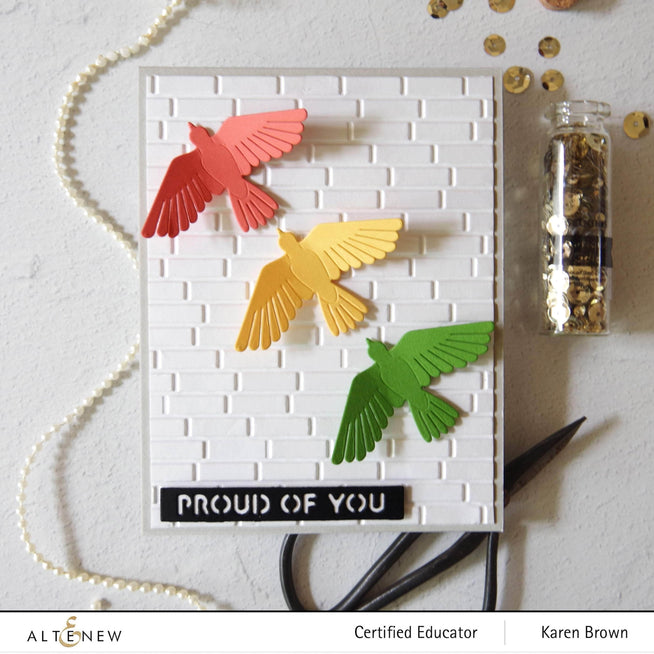 Altenew Feathered Friends die set with intricately designed metal dies for crafting bird-themed paper projects.