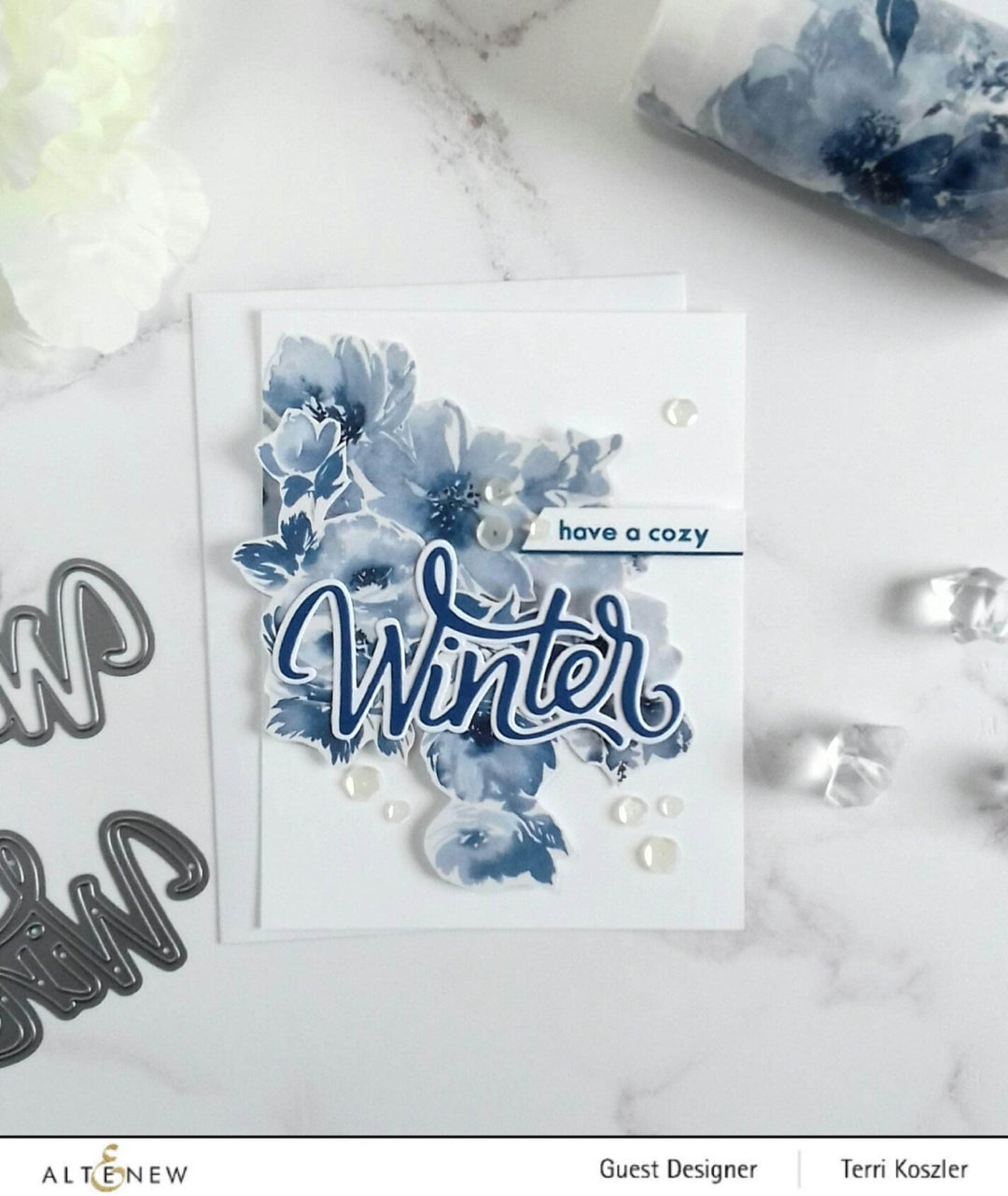Altenew Hello Winter Die Set featuring festive winter-themed metal dies for crafting and card making projects.