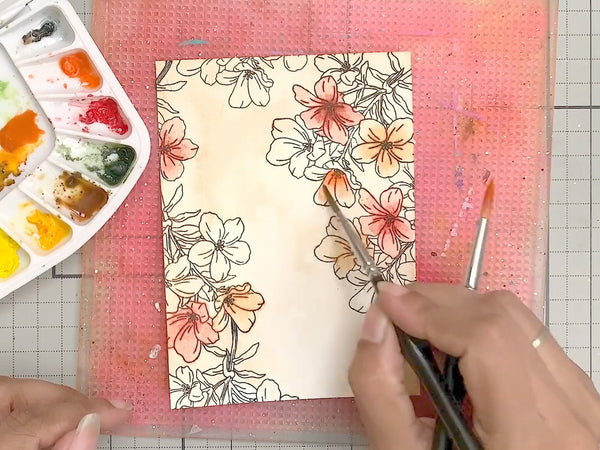 Add color to the stamped image using inks, watercolors, or markers.