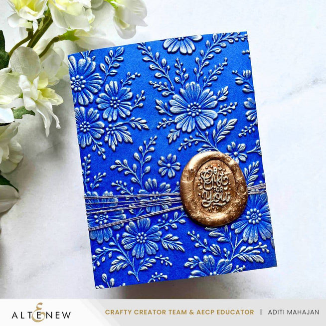 Altenew Piped Floral Lace 3D Embossing Folder showing intricate floral lace pattern for crafting and scrapbooking projects.